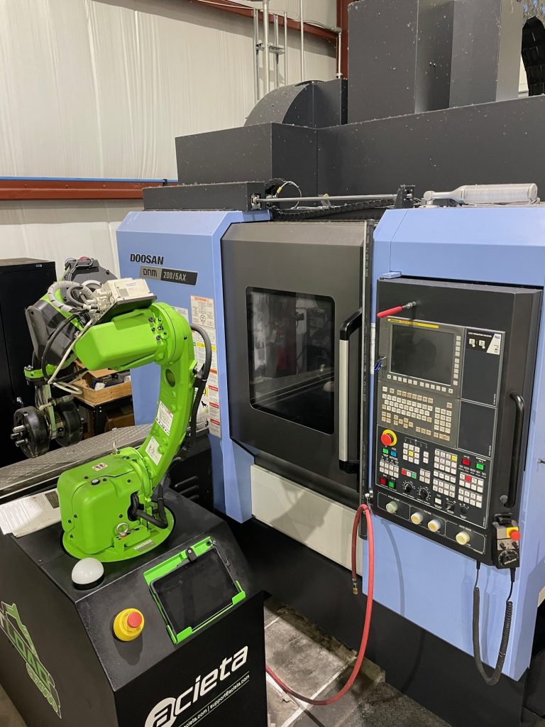 Doosan DNM200 5AX 5 axis machining center complex geometry aerospace defense Wisconsin