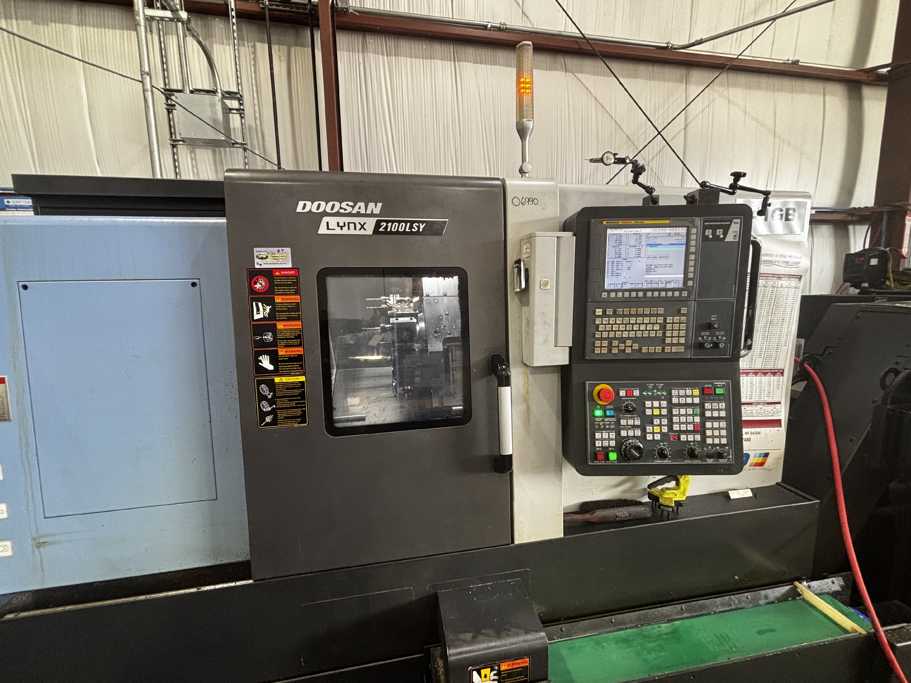 Doosan Lynx 2100LSY CNC turning center precision machined parts Wisconsin aerospace