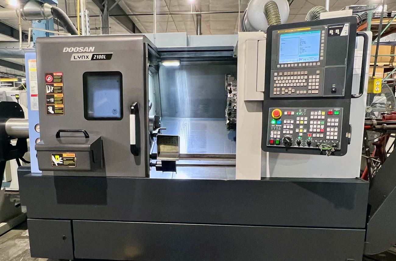 Doosan Lynx 2100LB CNC turning center precision machined parts Wisconsin defense